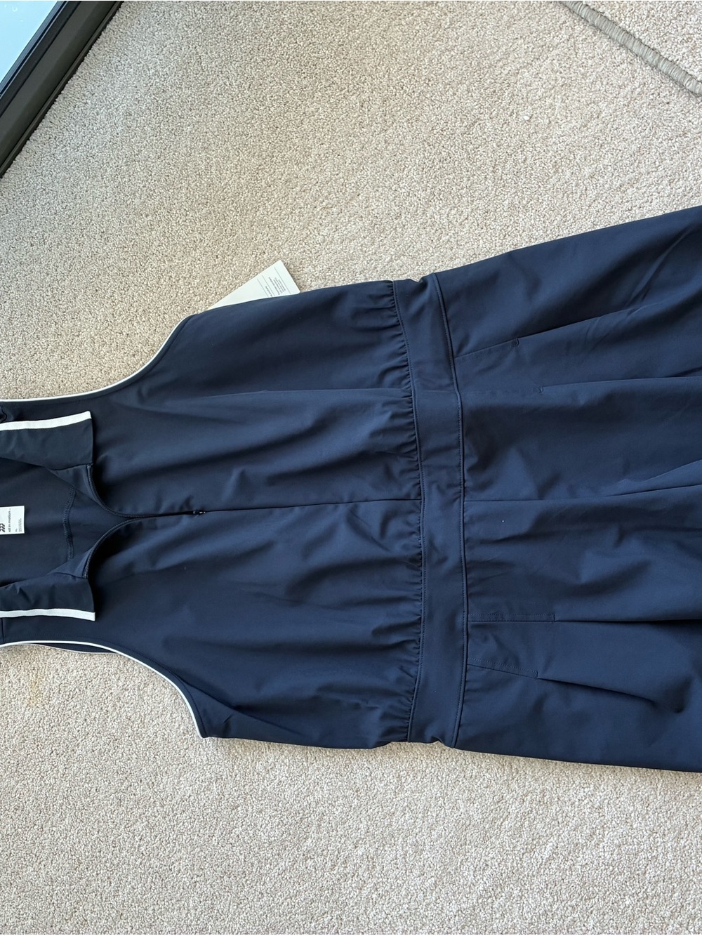 all in motion Navy golf romper with White Trim